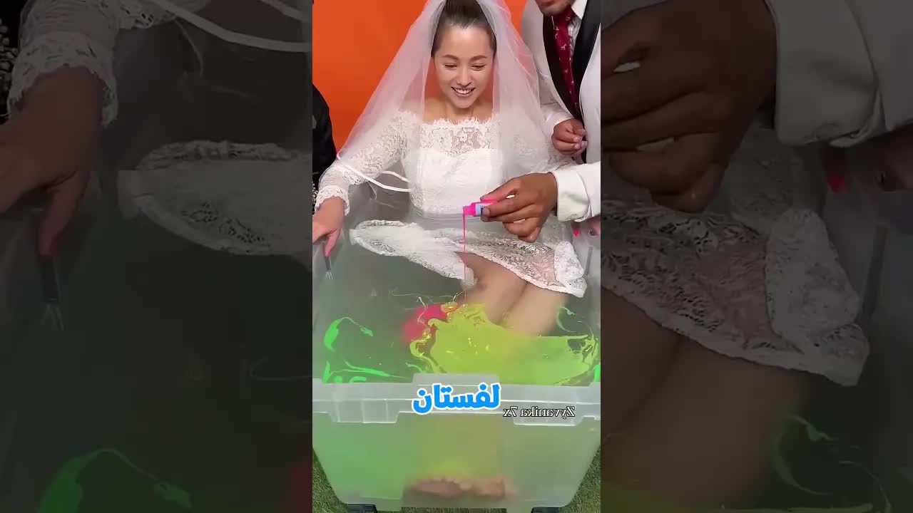 فستان العروس تحول إلى قوس قزح
