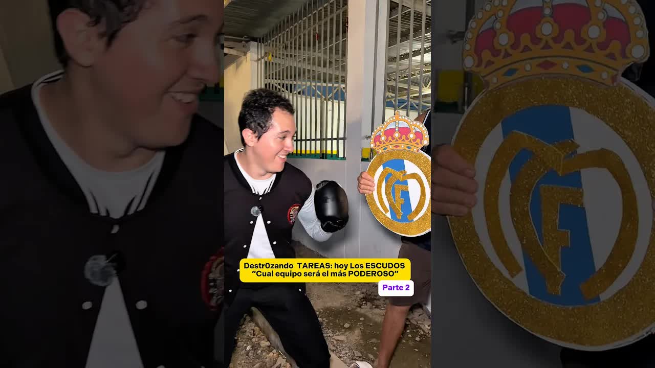 niños prueban sus escudos de cartón y bandera