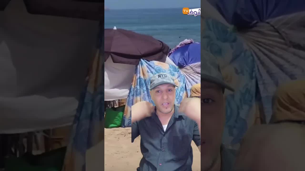 امرأة تمشي نحو البحر وتتفاجأ بحاجز الليزر