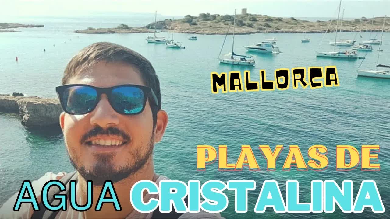 visitando una playa de aguas cristalinas en Mallorca