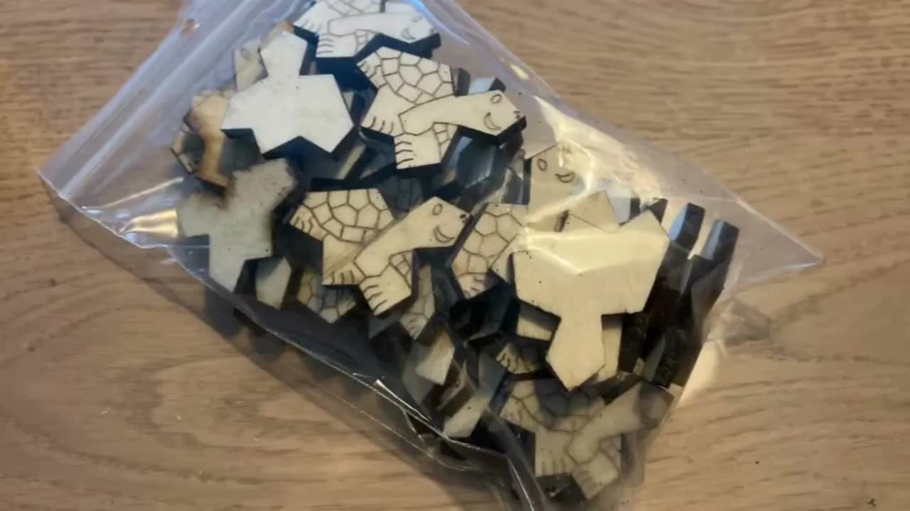 Mi faris puzlon per lasertranĉilo