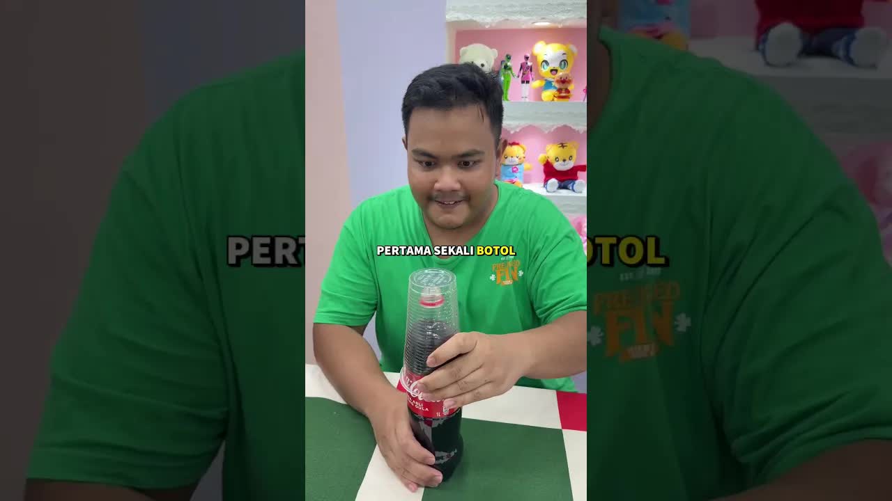 Cara Tuang Coca-Cola Tanpa Tumpah