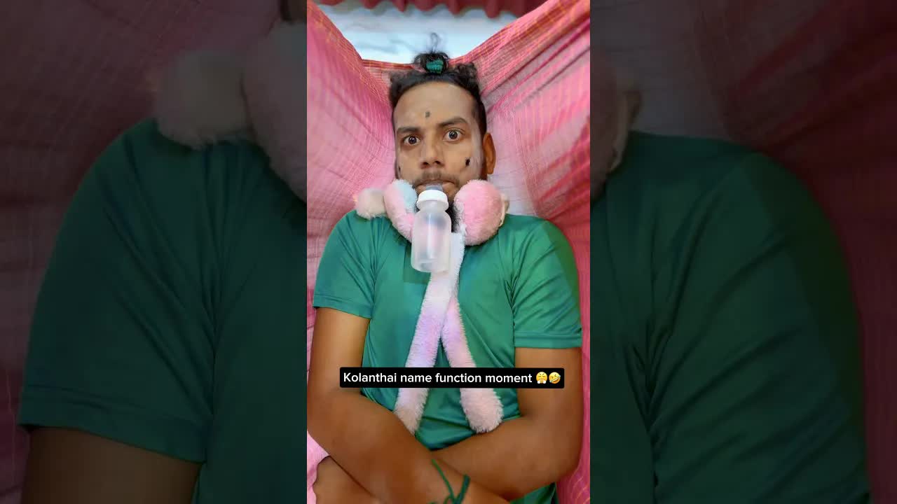 குழந்தைக்கு பெயர் வைக்கும் சிரிப்பு நிறைந்த காட்சி