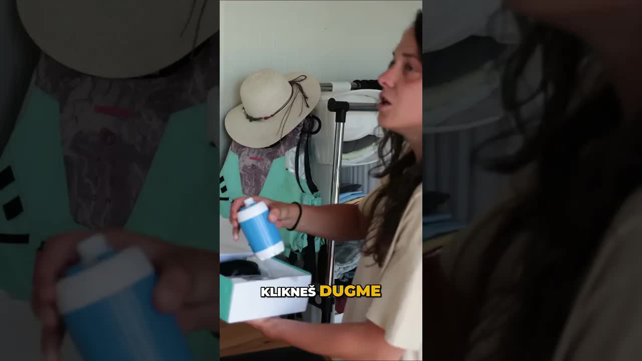 Prenosni tuš za kupanje pasa na Dunavu
