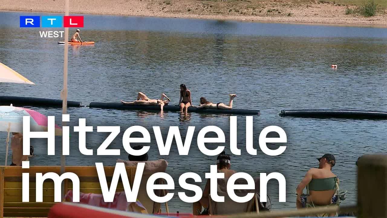 Hitzewelle in NRW: Sonne, Kunst und Fußballstimmung