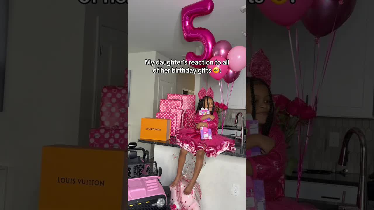 Toddler reacts to her birthday gifts