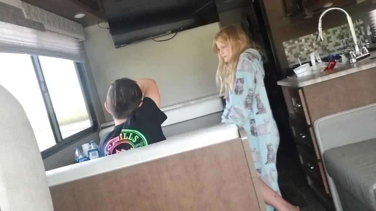 Kids Playing a Guessing Game in an RV
