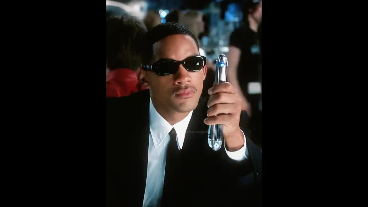 Agente J questiona o parceiro sobre a MIB