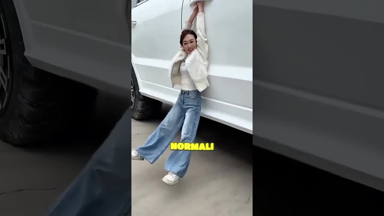 Una ragazza e la sua auto gigante